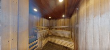 Indoor spa with cascading waterfall, steam room and cedar sauna